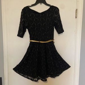 Black and gold party dress.